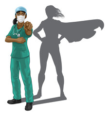 Nurse or doctor super hero woman in surgical or hospital scrubs with stethoscope and mask PPE. Pointing at viewer in a we need or want you gesture. Revealed as a superhero by the shape of her shadow.
