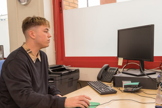 young intern working in an office