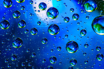 Abstract background about water or space. Multicolored stylish drops. Unusual splashes. It looks...