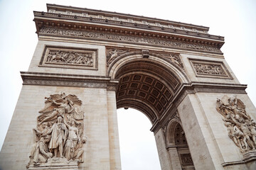 Obraz premium Arc de Triomphe, triumphal arch, one of Paris symbols.