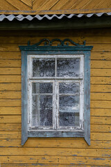 Window with traditional ornaments in ethnographic village Suminai, Lithuania