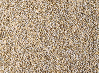 Oat bran pile background and texture