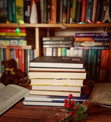 Christmas tree with books, bookshelf,  pine cone, christmas decorations.