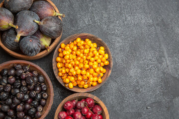 top view different fresh fruits inside plates on a dark background fruit color photo many mellow