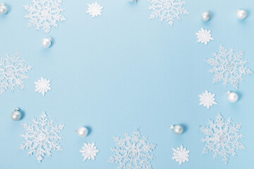 Blue Christmas holiday composition. Festive creative white pattern, xmas decor holiday ball with...