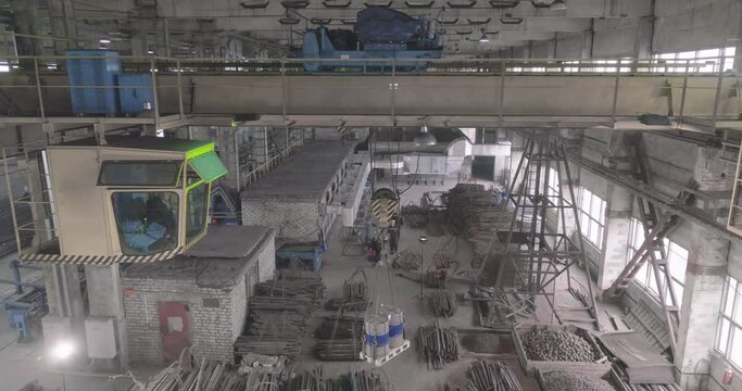 Industrial interior at the factory. Beam crane in the production, beam crane.