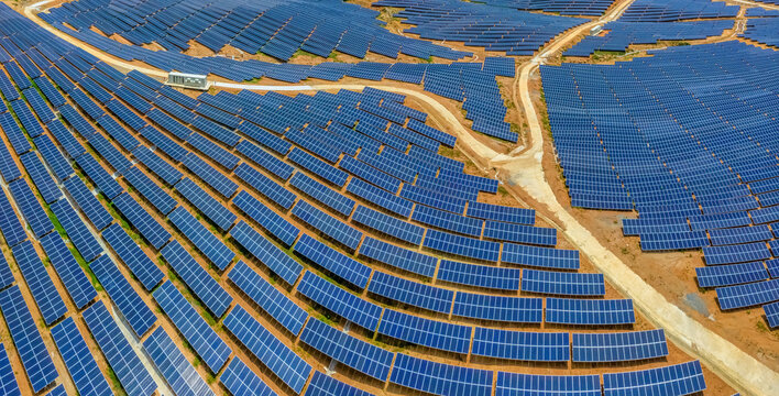 Aerial view of Solar panel, photovoltaic, alternative electricity source - concept of sustainable resources on a sunny day, Xuan Tho, Song Cau, Phu Yen, Vietnam