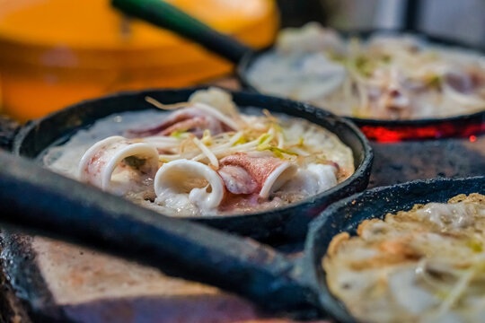 Xeo cake or Banh Xeo and shrimp, cuttle at Phu Yen, Vietnam