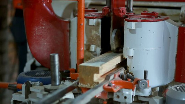 Woodworking machine for pulling profiled timber.