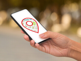 Woman Holding Smartphone With Opened Gps App And Pinpoint Icon On Screen