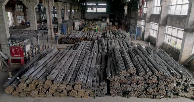 Metal warehouse, round metal billets from air, metal billets. Round billet metal pipes