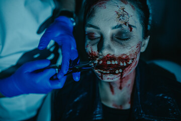Woman in image of mutant pull a tooth out in dental clinic.