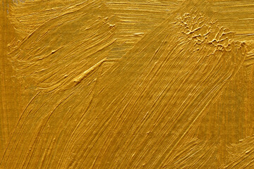 Modern contemporary acrylic background. Gold paint texture made with a brush. Luxury abstract...