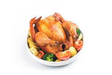 roasted chicken and vegetables on wooden table