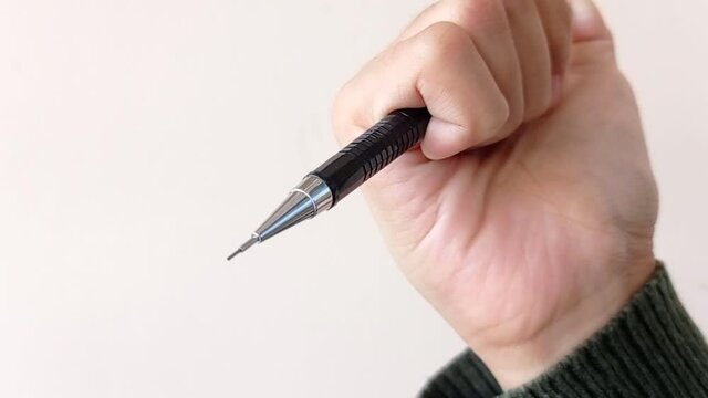 cute black mechanical pencil with white background
