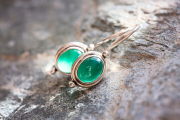 pair of sterling silver mineral stone earrings on natural background