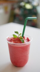 Top view Strawberry smoothie in take away cup isolated on white background