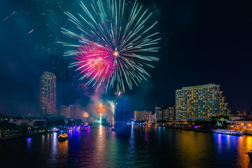 Fireworks to celebrate New Year on the Chao Phraya River in Bangkok, Thailand.