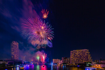 Fireworks to celebrate New Year on the Chao Phraya River in Bangkok, Thailand.