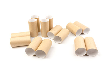 empty paper toilet rolls on white background