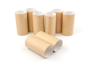 empty paper toilet rolls on white background