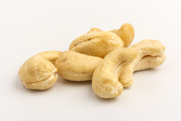Raw cashew nuts isolated on white background.