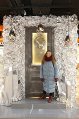 Russian woman. New Year's silver ornament, holiday decor, decorated Christmas photo zone in...