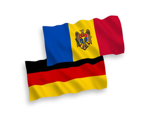 National vector fabric wave flags of Germany and Moldova isolated on white background. 1 to 2 proportion.
