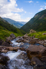 Naklejka na ściany i meble river in the mountains. mountain landscape. Background. Karachay Circassian Republic Russian Federation. Imereti lakes.