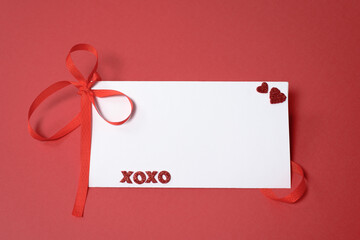 Valentines day or wedding mockup scene with blank card, paper hearts confetti, empty space for your text, top view