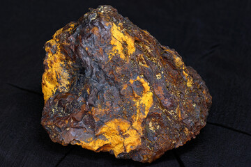 Beautiful specimen of limonite with hematite (iron ore) on a dark background
