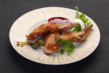 Roasted rabbit legs