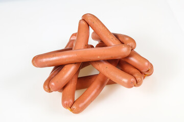 Tasty meat sausages over white background