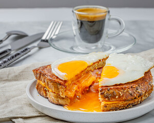 Croque madame delicious french breakfast with ham, cheese, mustard and eggs