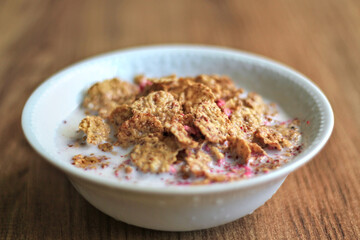 Cereals or cornflakes  stand on the table. Breakfast meal.