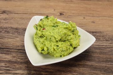 Avocado guacamole sauce with chili pepper