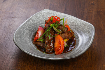 Beef with teriyaki sauce and vegetables