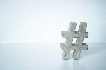 hashtag made of concrete on white table