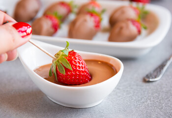 Strawberries with chocolate, delicious and gourmet dessert