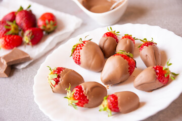 Strawberries with chocolate, delicious and gourmet dessert