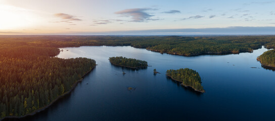 Aerial view of of small islands on a blue lake Haukkajarvi in Helvetinjarvi National park. Blue...