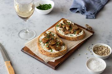 Bruschetta with mushrooms and white cheese. Healthy eating. Vegetarian food.