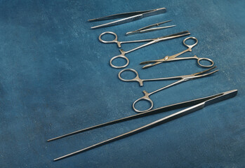 Old surgical instruments, shallow depth of sharpness, grunge background