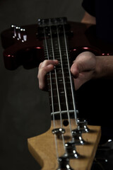 Guitar in hands close-up. Strings. Guitar neck. Music