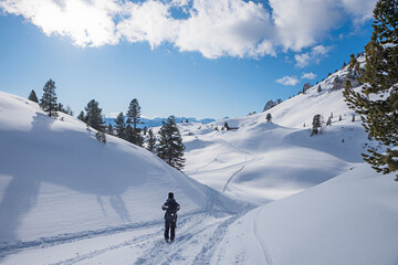 Fototapeta na wymiar winter hiker at mountain trail in snowy landscape Rofan, austrian alps