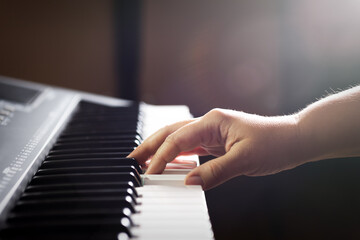Musician at a concert playing piano