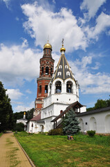 Fototapeta na wymiar Small bell tower. John the Theologian Monastery, Poshupovo, Ryazan Region, July 2, 2019