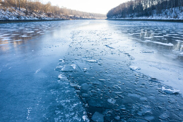 Recently frozen river with thin ice