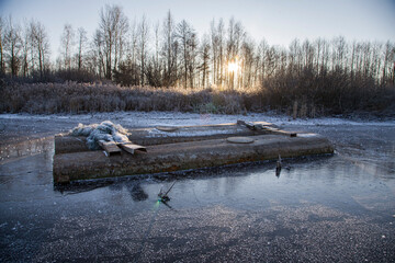 pontoons near the shore on a frozen lake