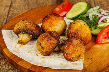 Grilled champignon with fresh vegetables